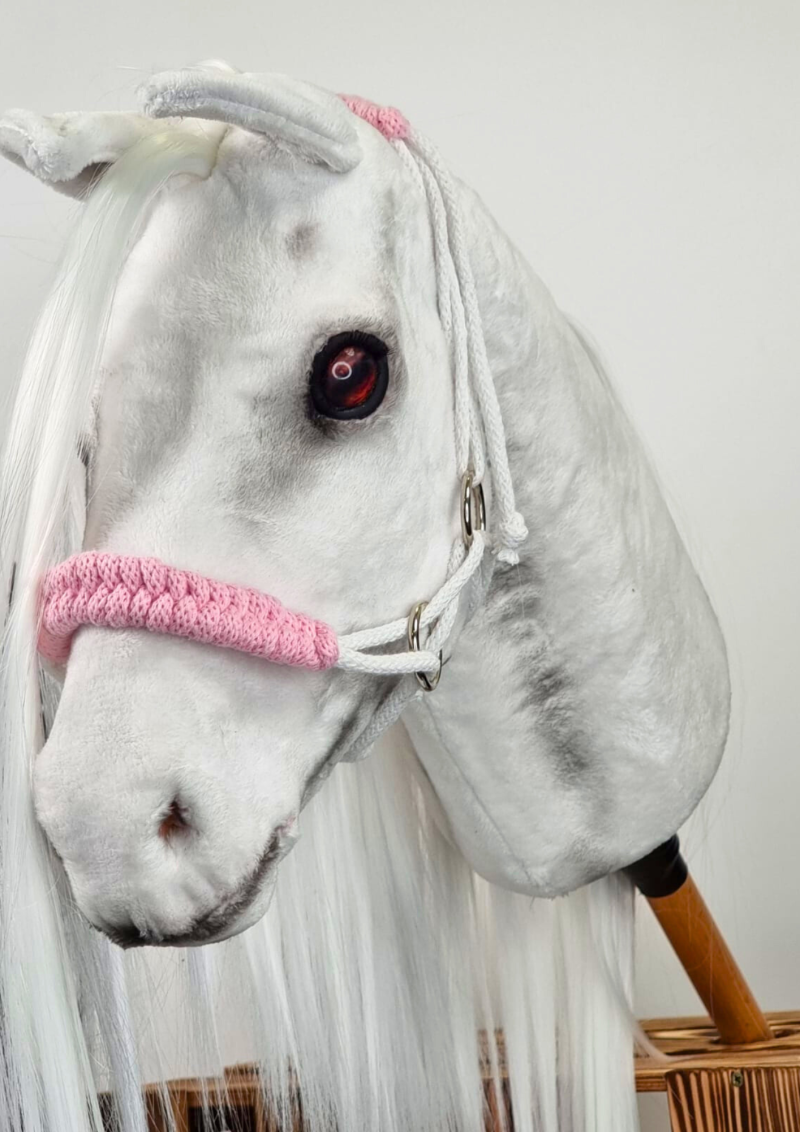 A braided halter for realistic hobby horses.